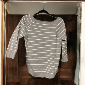 Medium light sweater bought from a local
Boutique tan and white